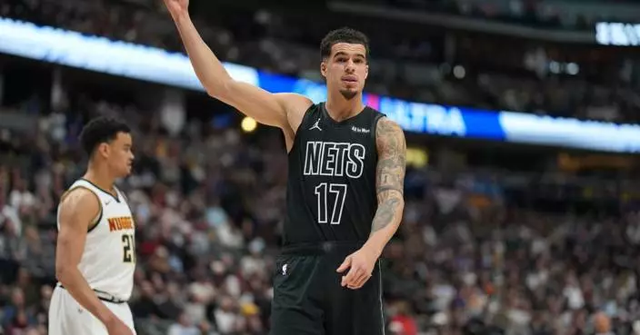 Murray scores 27, Nuggets beat Nets 107-103 in Porter’s return to Denver