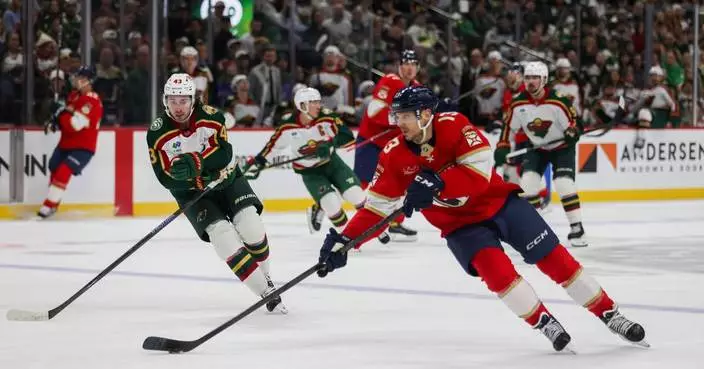 Brad Marchand scores 2, including decisive OT goal, in Panthers 4-3 win over Wild