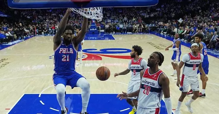 Embiid, George lead 76ers to a 131-110 win over Wizards, who acquire Trae Young in trade with Hawks