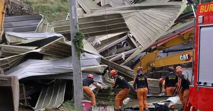 Photos show aftermath of avalanche of garbage at a Philippines landfill