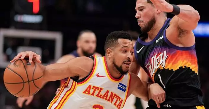 Suns’ Devin Booker rolls his ankle and Jalen Green also hurt in loss to Hawks