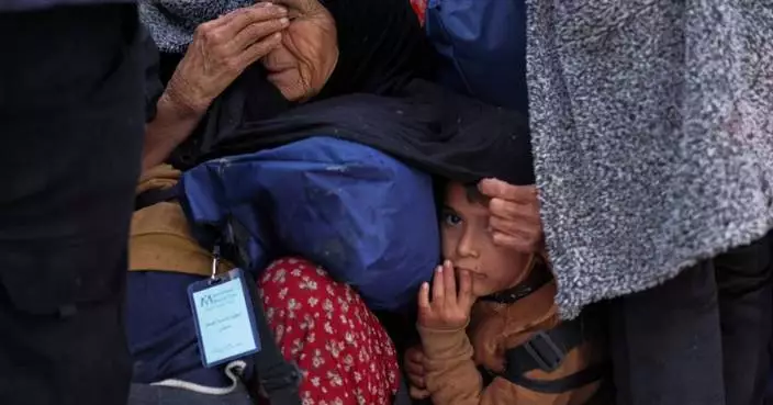 Photos show Syrians returning home following clashes between government forces and Kurdish fighters