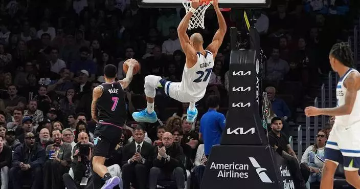 Edwards and Reid combine for 62, Timberwolves win 125-115 to snap Heat’s 4-game winning streak