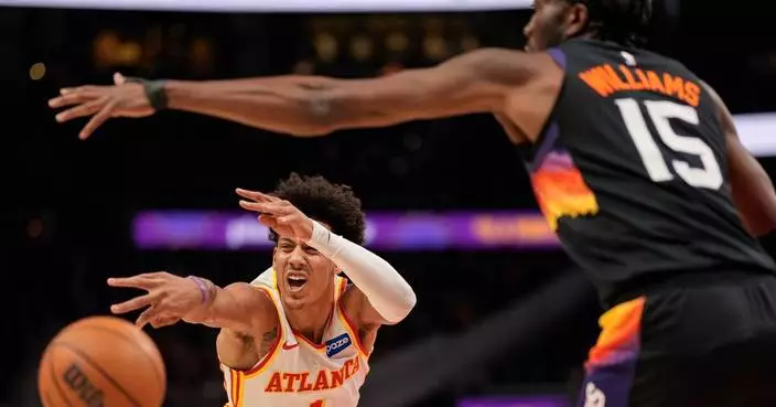 Hawks rally to beat Suns 110-103 after Phoenix loses Devin Booker to injury