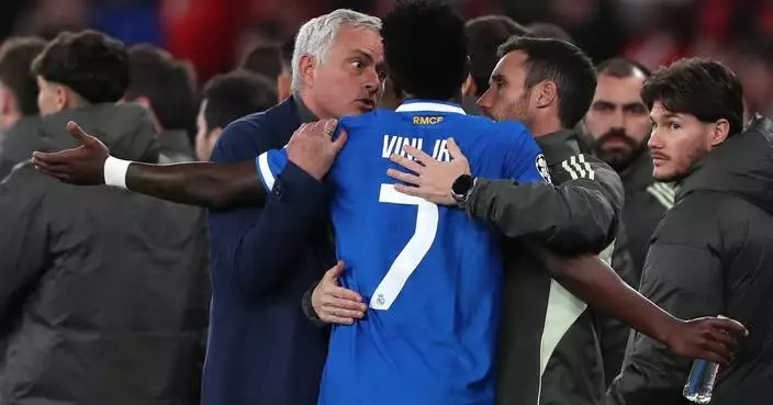 Madrid game at Benfica halted for several minutes as Vinícius says opponent racially insulted him