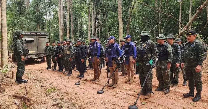 2 Cambodian journalists appeal treason convictions over a photo from Thai border clash