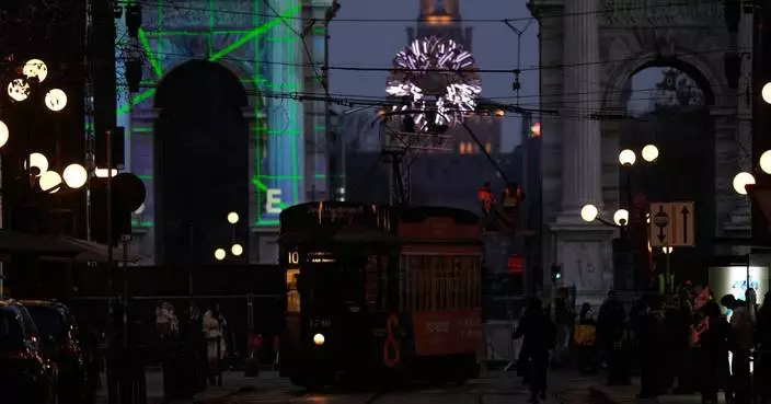 Milan’s historical trams at night as the city gears up for the Winter Olympic Games, in photos