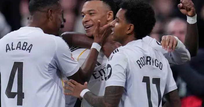 Mbappé's last-gasp penalty lifts Real Madrid to 2-1 win over Rayo Vallecano in Spanish league