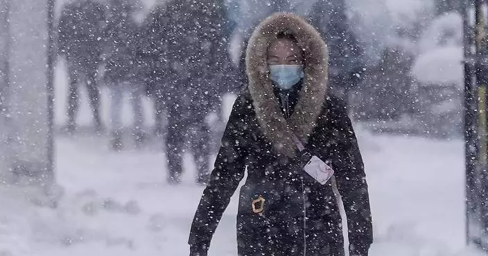 Northeast US digs out from brutal storm that disrupted flights and canceled school