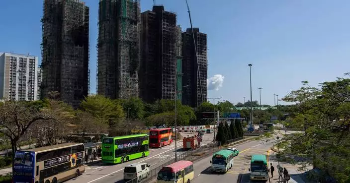 Hong Kong government offers to buy apartment ownerships from fire victims