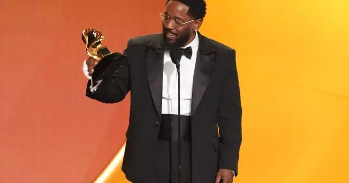 The Latest: Bad Bunny makes Grammy Awards history with album of the year win