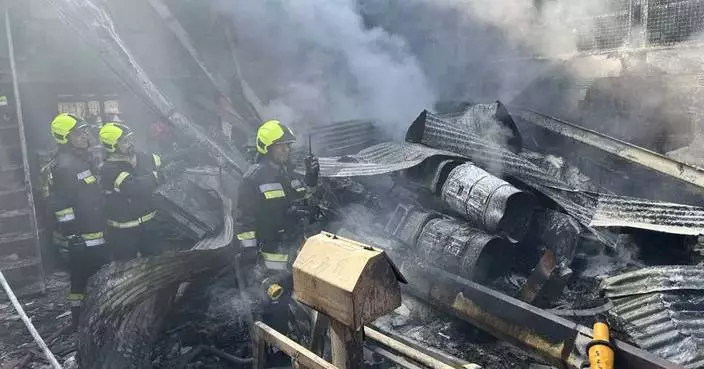 Iran military helicopter crashes into central fruit and vegetable market, reportedly killing 4