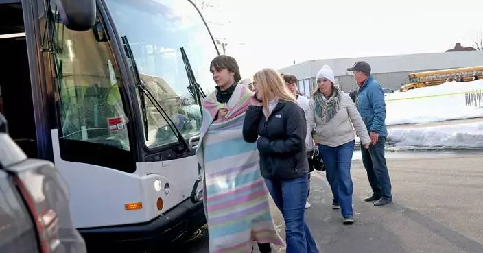 Police credit a good Samaritan for ending a deadly shooting at a Rhode Island ice rink