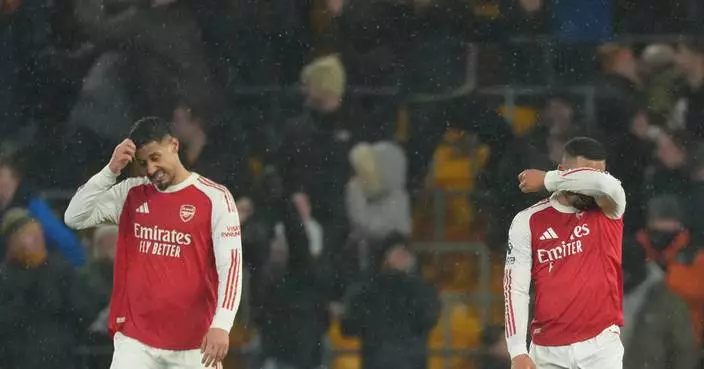 Arsenal blows two-goal lead at Wolves to boost Man City’s Premier League title chances