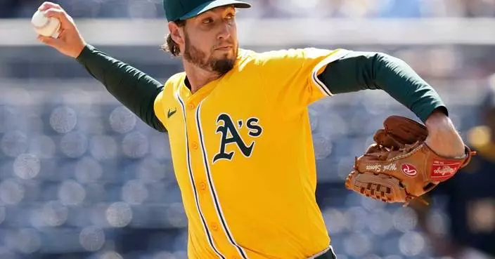 Royals acquire RHP Mitch Spence from the Athletics for RHP A.J. Causey