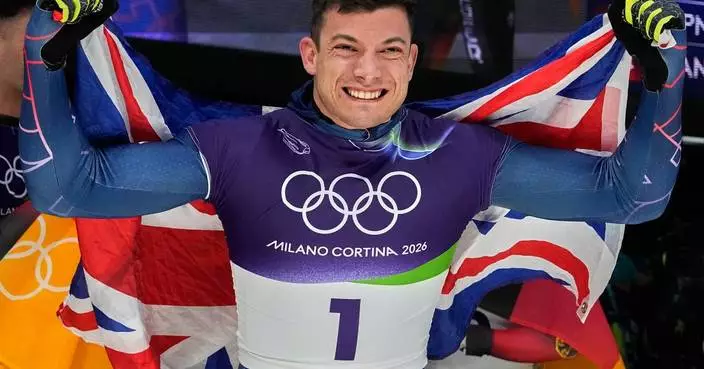 Weston gets his 1st Olympic skeleton gold medal, in race where Heraskevych was DQ’ed before start