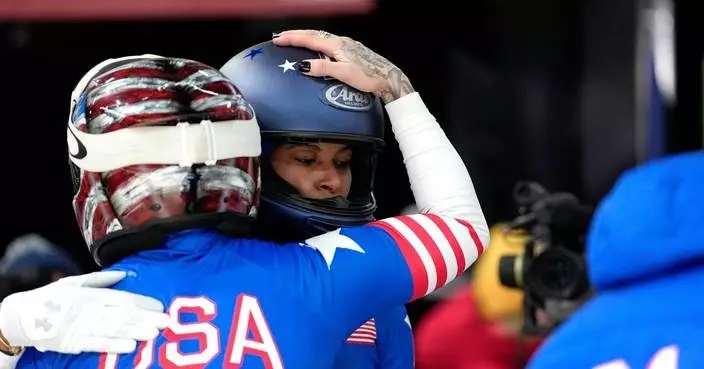 Hi, Moms: Humphries Armbruster, Jones 3rd at midpoint of Olympic bobsled race. Germany’s Nolte leads