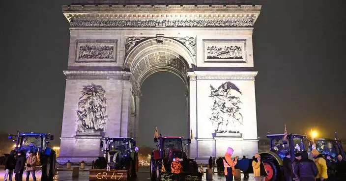 Paris police fatally shoot a knife-wielding man who tried to attack officers at Arc de Triomphe