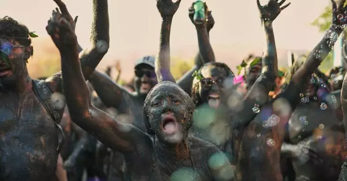 Mud madness at Brazil’s Carnival in photos