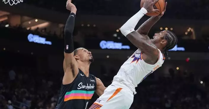 Spurs beat the Suns 121-94 in Austin for their 7th straight win