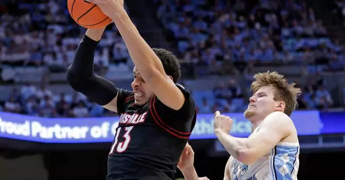 Seth Trimble scores a career-high 30 points as No. 18 UNC holds off No. 24 Louisville 77-74