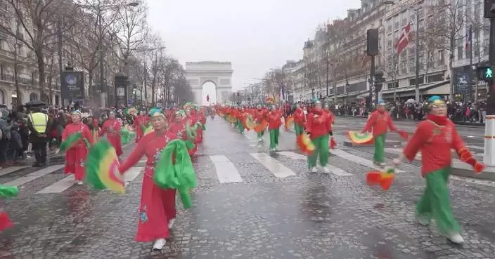 Chinese New Year parade goes through Champs-Elysees in Paris