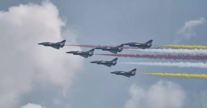 Chinese PLA aerobatic team conducts validation flight ahead of Singapore Airshow