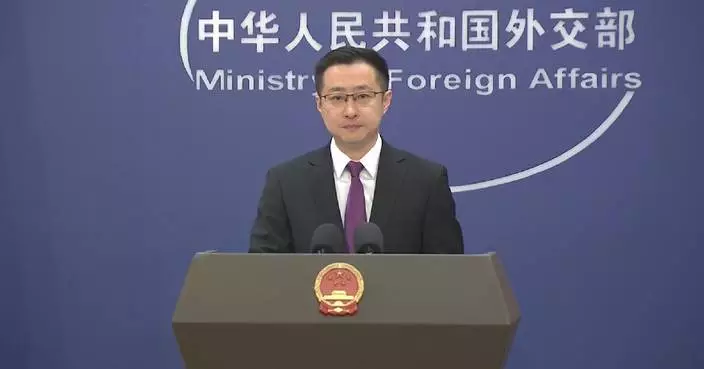 China calls on peace-loving countries to join hands in containing Japan’s re-militarization