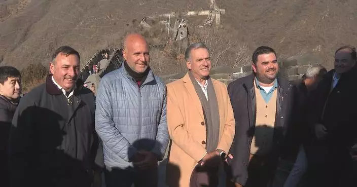 Uruguayan president climbs section of Great Wall during state visit to China