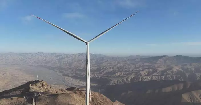 Wind power project with highest altitude starts operation in Xinjiang