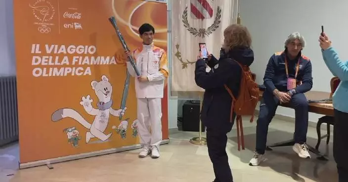 Excitement builds in Italy as crowds gather to catch glimpse of Olympic flame