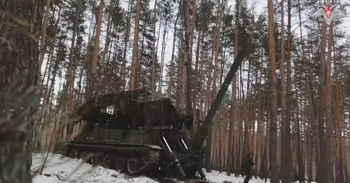 Russia reports attacking Ukraine’s military airport, Ukraine says shooting down Russian drones