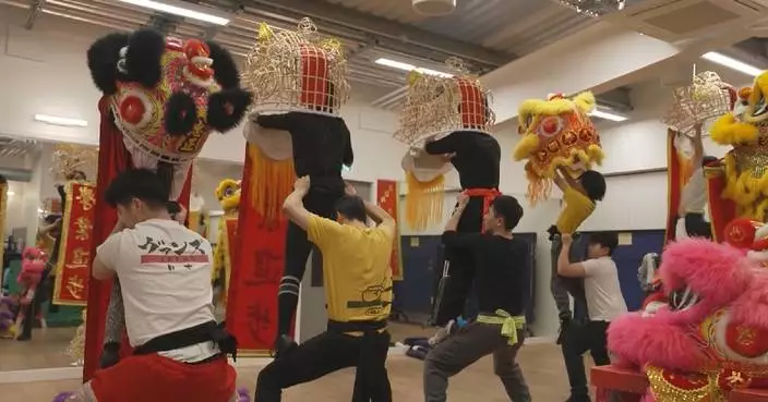London lion dance troupe leaps into action for Spring Festival celebrations