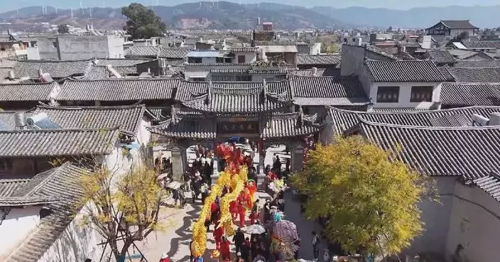 Ancient Chinese town ushers in Year of Horse with traditional dragon parade