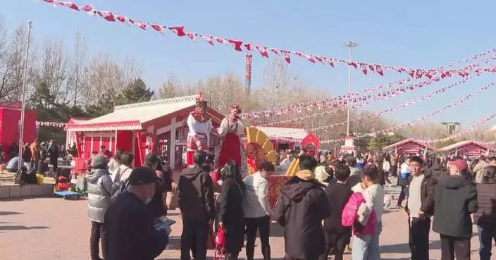 Int’l tourists flock to Beijing as Spring Festival blends tradition with global culture
