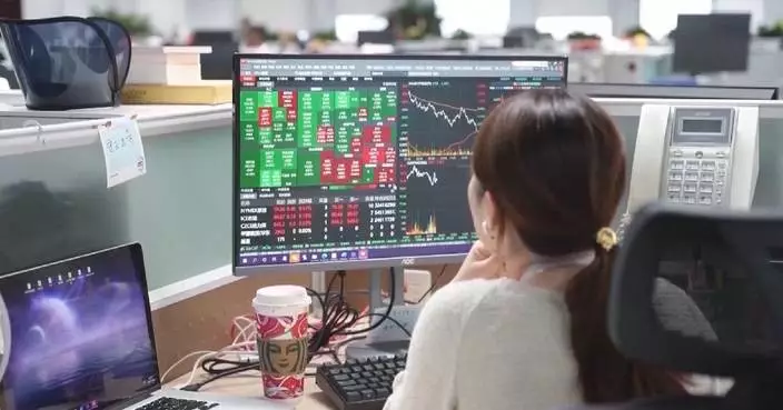 Chinese shares close mixed Friday amid PBOC cuts FX risk reserve ratio