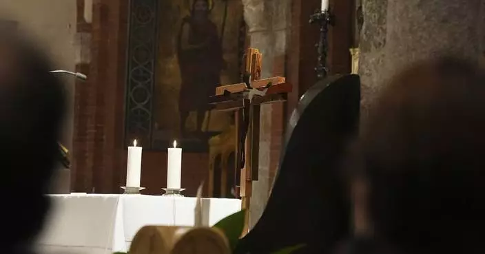 Catholic cross like no other is a beacon of unity in Olympic host city Milan