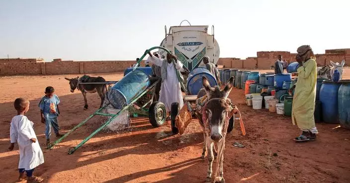 Famine spreads to more towns in Sudan’s Darfur region, hunger experts warn as war rages on