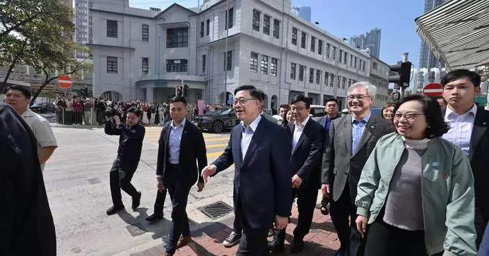 Hong Kong Officials Celebrate Chinese New Year with Household Visits Across All Districts