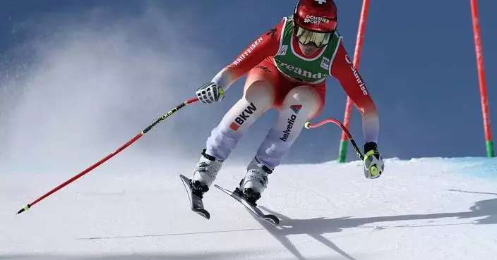 Swiss skier Suter wins 1st race since Olympics as chase starts for Vonn’s World Cup downhill lead