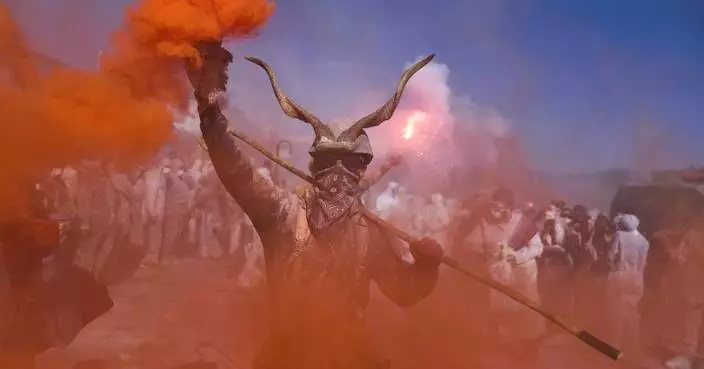 'Flour war' erupts in Greek seaside town as revelers celebrate the start of Lent