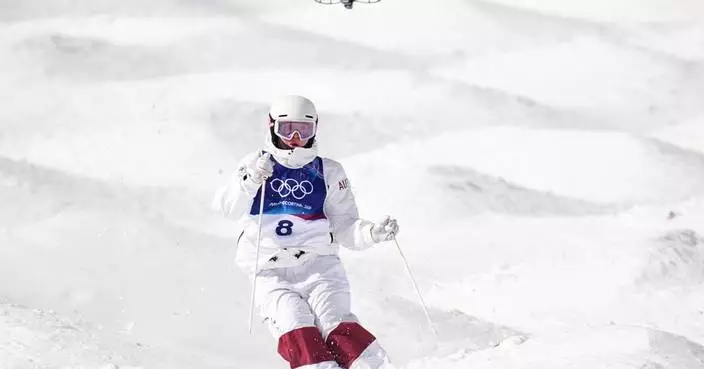 Remote-piloted drones chase Olympians at the Winter Games, in photos