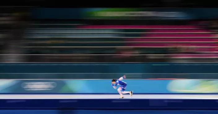 Photos show athletes as a blur of motion at the Milan Cortina Winter Olympics