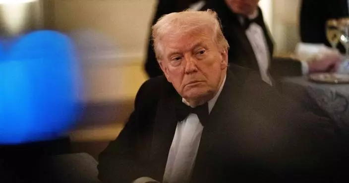 The Latest: Trump says he’ll raise tariffs to 15% after Supreme Court ruling