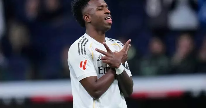 Vinícius Júnior scores 2 and Mbappé-less Real Madrid beats Real Sociedad 4-1 to move top in Spain