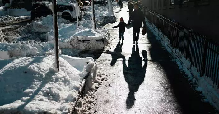 Northeast US scrambles to clear piles of snow as new storm descends on the region