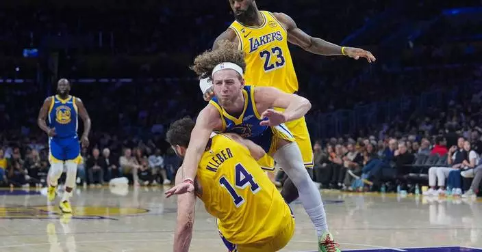 LeBron James has 20 points, 10 assists to lead Luka-less Lakers past Warriors