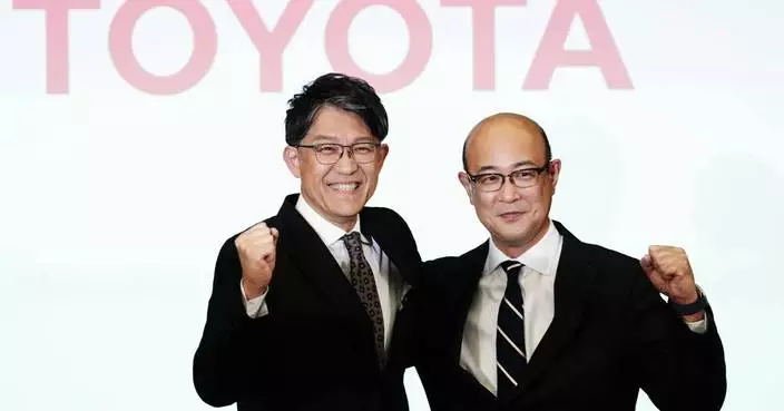 Japan's top automaker Toyota names a new CEO after reporting drop in profits