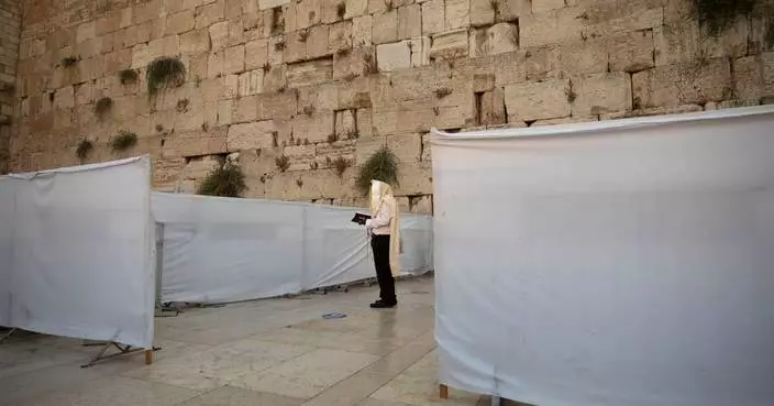 Israel's parliament moves toward ban on mixed-gender prayer at Jerusalem's Western Wall