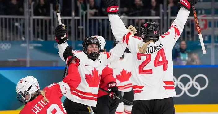 Marie-Philip Poulin is hurt in Canada's Olympic hockey game against Czechia
